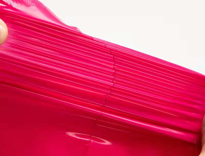 比如玫红色快递袋-05